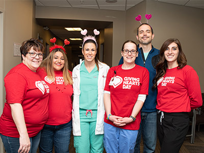 The JRMC Orthopedics team wears red in celebration of Giving Hearts Day.
