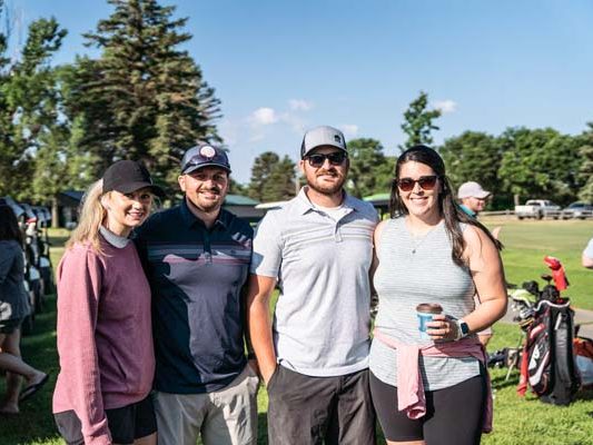 team at GOLF "fore" ANGELS event