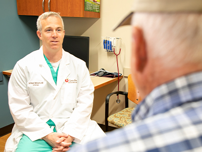Dr. Brent Williams with patient