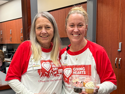 Meredith Weisz and Jennifer Keim celebrate Giving Hearts Day at JRMC.