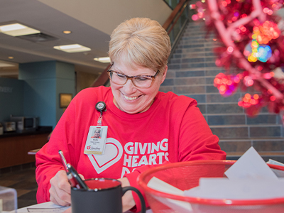 Holly Wald, Patient Access Management assists with Giving Hearts Day.