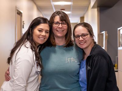 Image of Shawntil Knecht and daughters.
