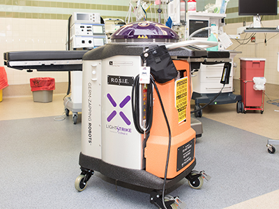R.O.S.I.E. is a Xenex LightStrike Germ-Zapping Robot. She kills germs and viruses that are difficult to disinfect and treat, including COVID-19.