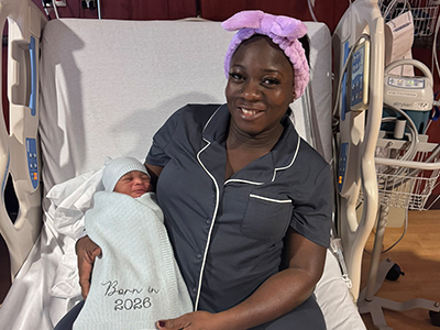 Image of Janet Benson with newborn Christopher