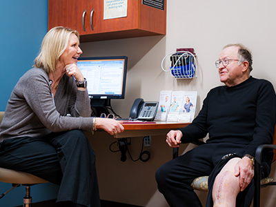 Image of Orthopedic Surgeon Dr. Roxanne Keene and patient Bruce Willyard