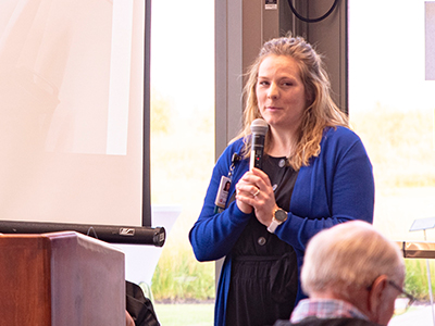 Image of JRMC Nurse Practitioner Makenzie Breitbach speaking at the Pillars of Giving event.