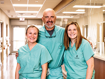 Image of JRMC OB/GYN Dr. Emily Stromquist, Dr. Gregg McAdoo and Nurse Practitioner Makenzie Breitbach